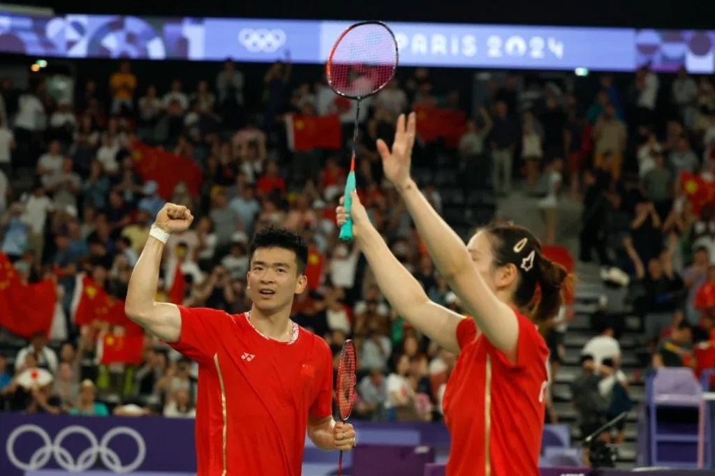 First Olympic Gold for China's Zheng Siwei and Huang Yaqiong